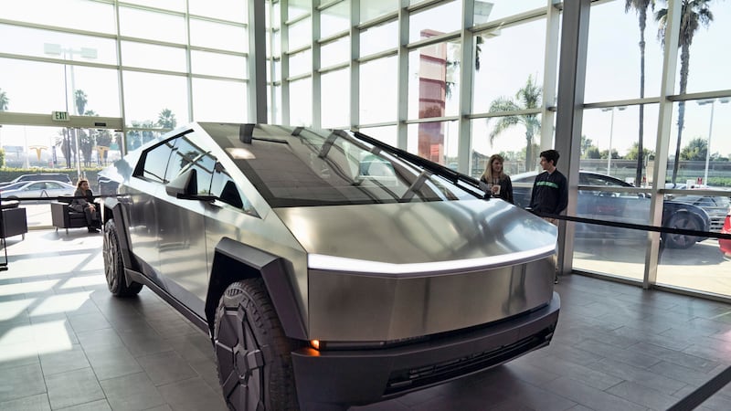 FILE - A Tesla Cybertruck is on display at the Tesla showroom in Buena Park, Calif., Dec. 3,...